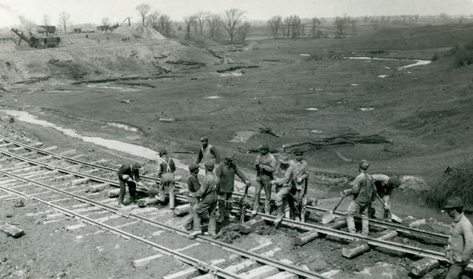 <p>Track was laid along the construction site to allow train engines and cars to move heavy loads into and out of work areas. Photo – April 17, 1914. Photo attribution: St. Catharines Museum, 2712-R – Library &amp; Archives Canada, PA-061139 – John Boyd Collection</p>